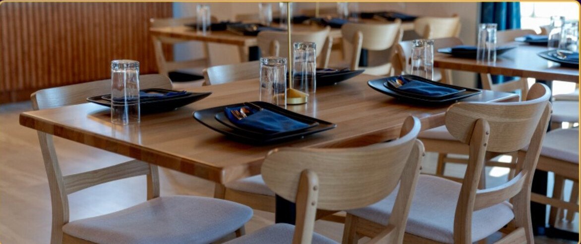 Set tables in the Mahek dining room